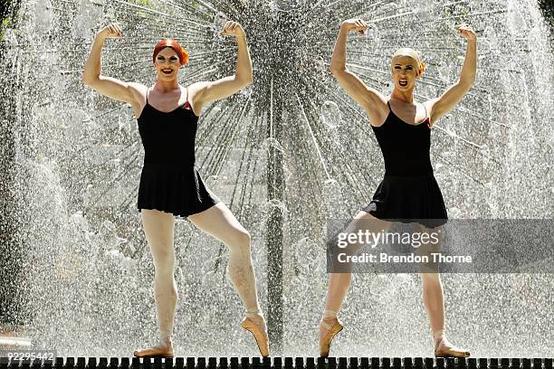 Two members of The Trocks, the all male ballet company from New York, dance in Kings Cross fountain on October 23, 2009 in Sydney, Australia. Les...