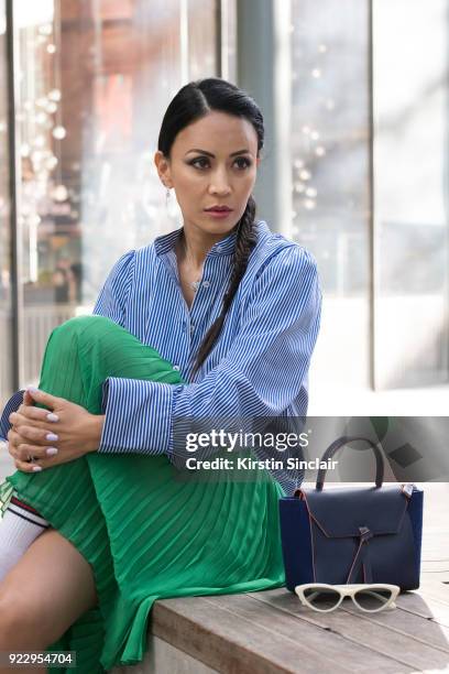 Digital Influencer Vicky Lee wears a Baum und Pferogarten dress, De Beers earrings and necklace, Black eyewear sunglasses and an Alexandra De Curtis...