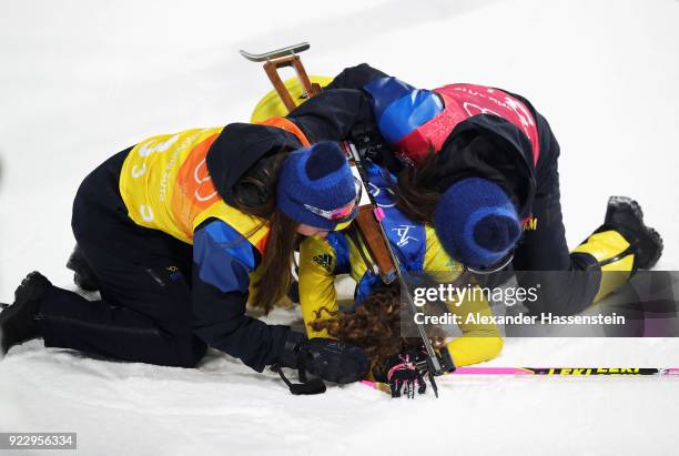 Hanna Oeberg of Sweden celebrates winning silver with team mates during the Women's 4x6km Relay on day 13 of the PyeongChang 2018 Winter Olympic...