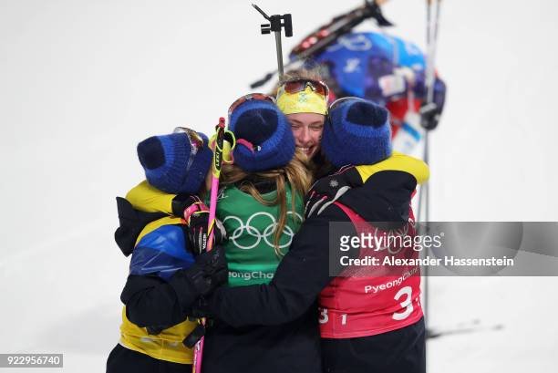 Hanna Oeberg of Sweden celebrates winning silver with team mates during the Women's 4x6km Relay on day 13 of the PyeongChang 2018 Winter Olympic...