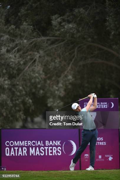 Oliver Fisher of England tees off on the 7th hole during the first round of the Commercial Bank Qatar Masters at Doha Golf Club on February 22, 2018...
