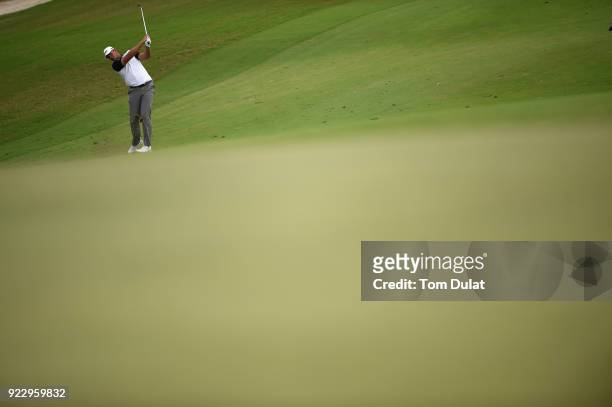Jonathan Thomson of England hits an approach shot on the 7th hole during the first round of the Commercial Bank Qatar Masters at Doha Golf Club on...