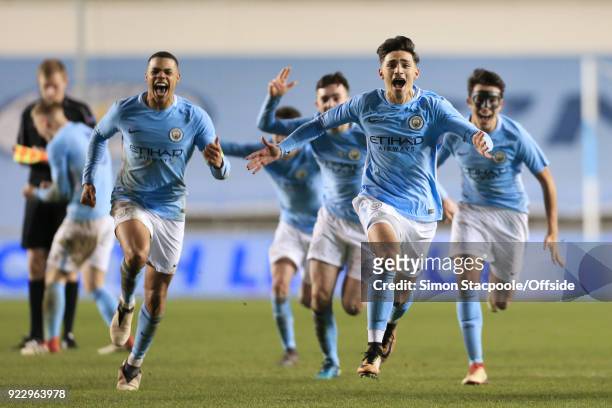 Nabil Touaizi of Man City leads the celebrations following victory in the penalty shootout during the UEFA Youth League Round of 16 match between...