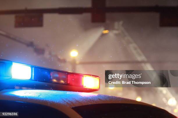 police and fire - coche de policía fotografías e imágenes de stock