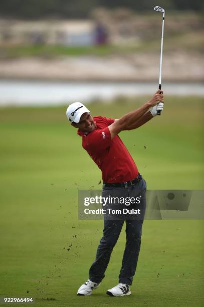 Edoardo Molinari of Italy hits an approach shot during the first round of the Commercial Bank Qatar Masters at Doha Golf Club on February 22, 2018 in...