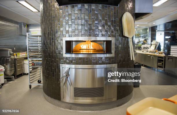 Pizza oven stands in the cafeteria of the new Google Inc. Campus in Boulder, Colorado, U.S., on Wednesday, Feb. 21, 2018. Google moved it's 800...