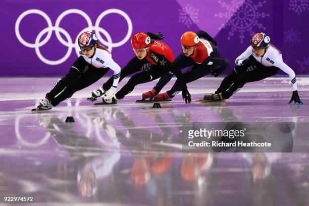 Chunyu Qu of China, Minjeong Choi of Korea, Sukhee Shim of Korea and Suzanne Schulting of the Netherlands compete during the Short Track Speed...