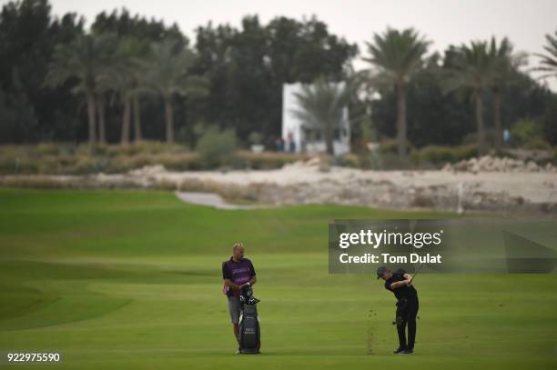 Pontus Widegren of Sweden hits an approach shot during the first round of the Commercial Bank Qatar Masters at Doha Golf Club on February 22, 2018 in...