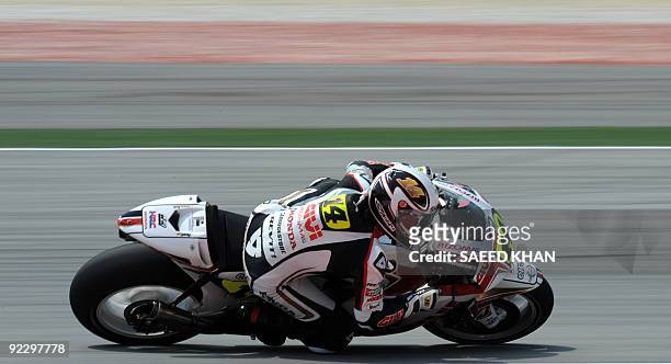 France's Randy de Puniet of the LCR Honda MotoGP team rides his bike during the first practice session of the Malaysian Motorcycle Grand Prix at the...