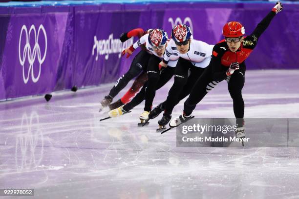 Dajing Wu of China skates on his way to winning gold ahead of Daeheon Hwang of Korea, silver, and Hyojun Lim of Korea, bronze, in the Men's 500m...