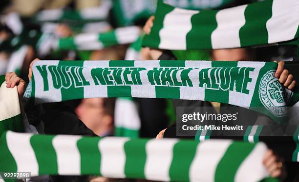 Celtic fans hold up their scarves during the UEFA Europa League Group C match between Celtic and Hamburger SV at Celtic Park on October 22, 2009 in...