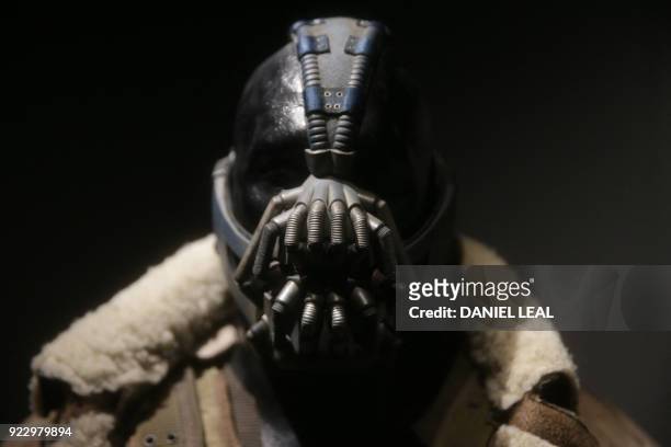Bane supervillain costume worn by Tom Hardy in the movie 'The Dark Knight Rises, 2012' and designed by costume designer Lindy Hemming is displayed...
