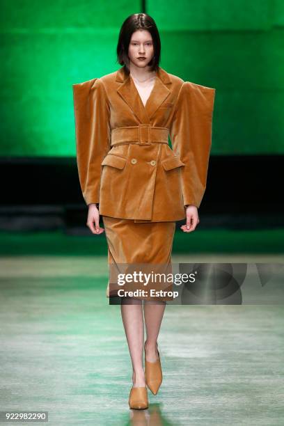 Model walks the runway at the Annakiki show during Milan Fashion Week Fall/Winter 2018/19 on February 21, 2018 in Milan, Italy.