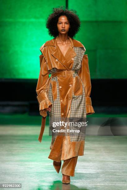 Model walks the runway at the Annakiki show during Milan Fashion Week Fall/Winter 2018/19 on February 21, 2018 in Milan, Italy.