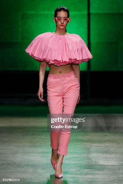 Model walks the runway at the Annakiki show during Milan Fashion Week Fall/Winter 2018/19 on February 21, 2018 in Milan, Italy.