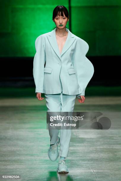 Model walks the runway at the Annakiki show during Milan Fashion Week Fall/Winter 2018/19 on February 21, 2018 in Milan, Italy.