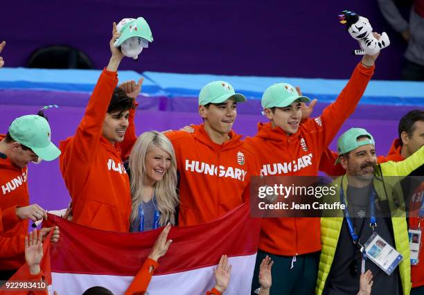 Elise Christie of Great Britain poses with boyfriend Shaolin Sandor Liu of Hungary and his teammates, his brother Shaoang Liu, Viktor Knoch, Csaba...