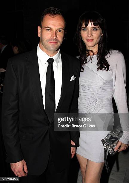 Jonny Lee Miller and wife Michele Hicks pose at the opening night party for "After Miss Julie" on Broadway at Espace on October 22, 2009 in New York...