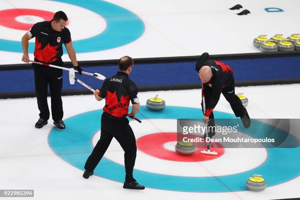 Ben Hebert, Brent Laing and Kevin Koe of Canada compete in the Curling Men's Semi-final against the USA on day thirteen of the PyeongChang 2018...