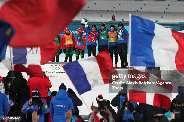 Bernard Chevalier of France, Marie Dorin Habert of France, Justine Braisaz of France, Anais Bescond of France win the bronze medal during the...