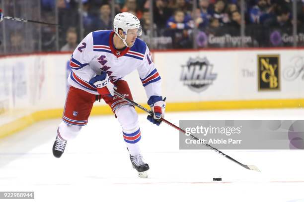 Peter Holland of the New York Rangers skates with the puck in the first period against the New York Islanders during their game at Barclays Center on...