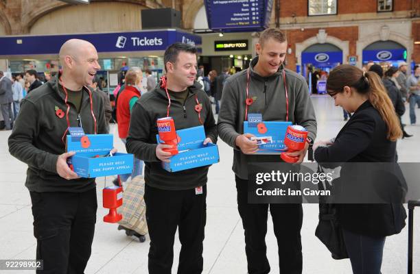 Serving British Army soldiers and recording artists Sergeant Major Gary Chilton, Sergeant Richie Maddocks and Lance Corporal Ryan Idzi of 'The...