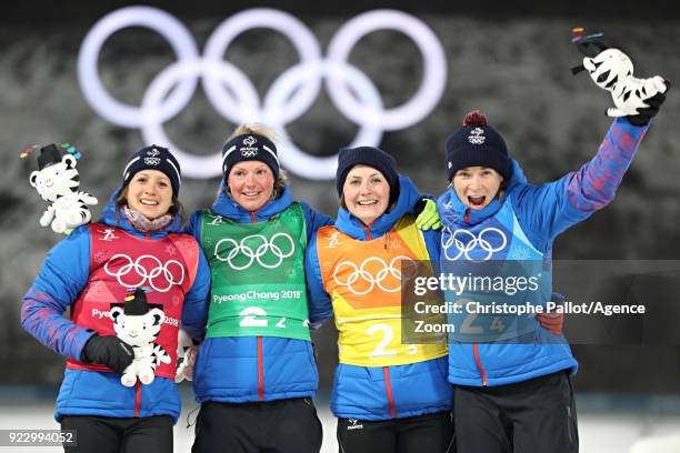 Anais Chevalier of France, Marie Dorin Habert of France, Justine Braisaz of France, Anais Bescond of France celebrate during the Biathlon Women's...