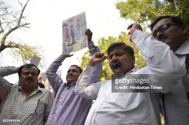 Supporters of BJP Protesting against the MLAs of Aam Aadmi Party on their behavior with Delhi chief secretary Anshu Prakash outside the residence of...