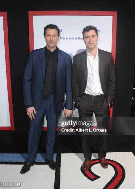 Directors Jonathan Goldstein and John Francis Daley arrive for the Premiere Of New Line Cinema And Warner Bros. Pictures' "Game Night" held at TCL...