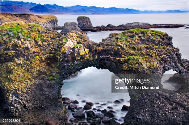 hellnar arch at the snaefellsnes peninsula - hellnar stock pictures, royalty-free photos & images