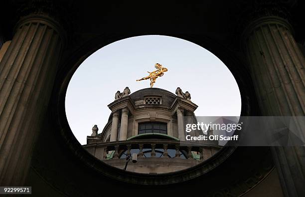 Gold statue is seen on the roof of the Bank of England on the morning that the Office for National Statistics announced that the UK is in the longest...