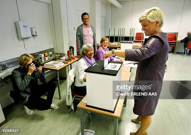 The leader of of the Norwegian Progress Party, Siv Jensen casts her ballot at a polling station in Nordseter School in Oslo for the general election...