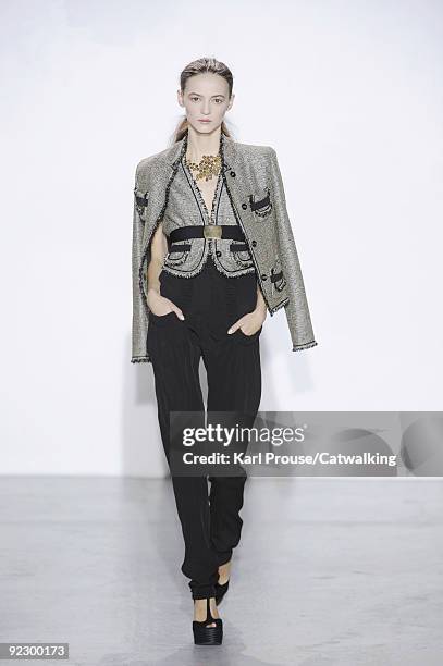 Model walks the runway during the Veronique Leroy ready to wear show as part of the Paris Womenswear Fashion Week Spring/Summer 2010 at Espace...