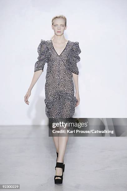 Model walks the runway during the Veronique Leroy ready to wear show as part of the Paris Womenswear Fashion Week Spring/Summer 2010 at Espace...