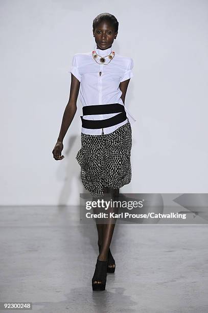 Model walks the runway during the Veronique Leroy ready to wear show as part of the Paris Womenswear Fashion Week Spring/Summer 2010 at Espace...