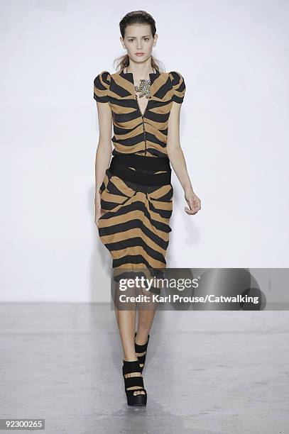 Model walks the runway during the Veronique Leroy ready to wear show as part of the Paris Womenswear Fashion Week Spring/Summer 2010 at Espace...