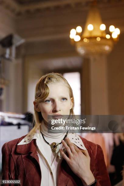 Model, necklace detail, is seen backstage ahead of the Emilio Pucci show during Milan Fashion Week Fall/Winter 2018/19 on February 22, 2018 in Milan,...