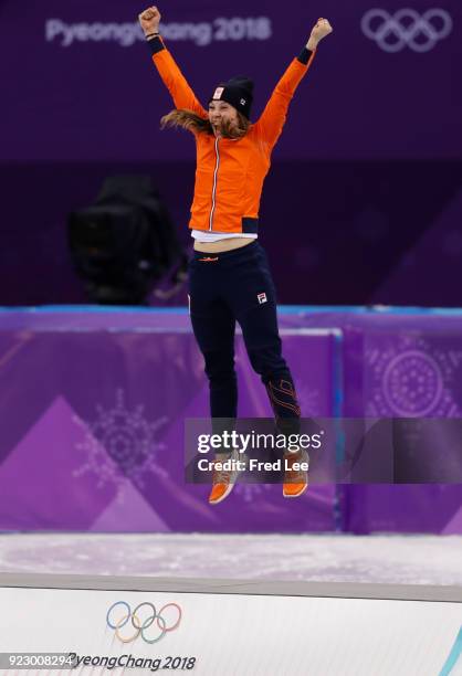 Gold medalist Suzanne Schulting of the Netherlands celebrates during the victory ceremony after the Short Track Speed Skating Ladies' 1,000m Final A...
