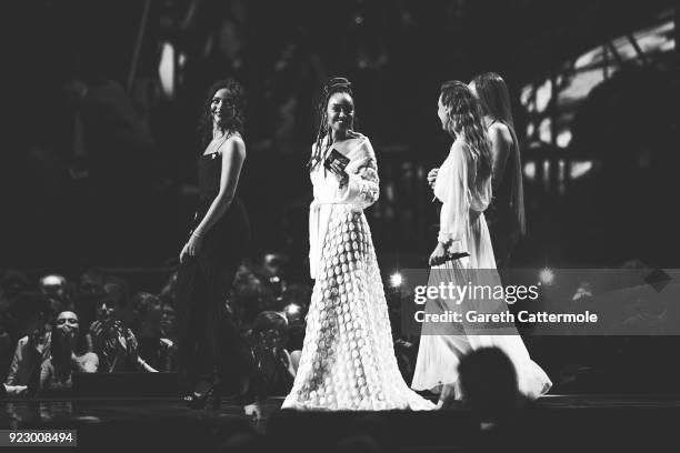 Jade Thirlwall, Leigh Anne Pinnock, Perrie Edwards and Jesy Nelson of Little Mix onstage at The BRIT Awards 2018 held at The O2 Arena on February 21,...