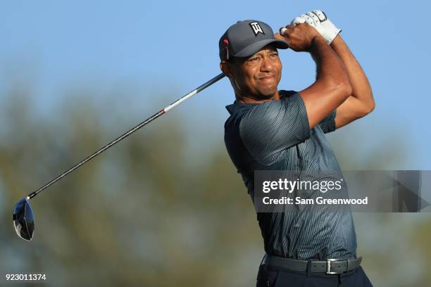 Tiger Woods plays a tee shot at 14th hole during the first round of the Honda Classic at PGA National Resort and Spa on February 22, 2018 in Palm...