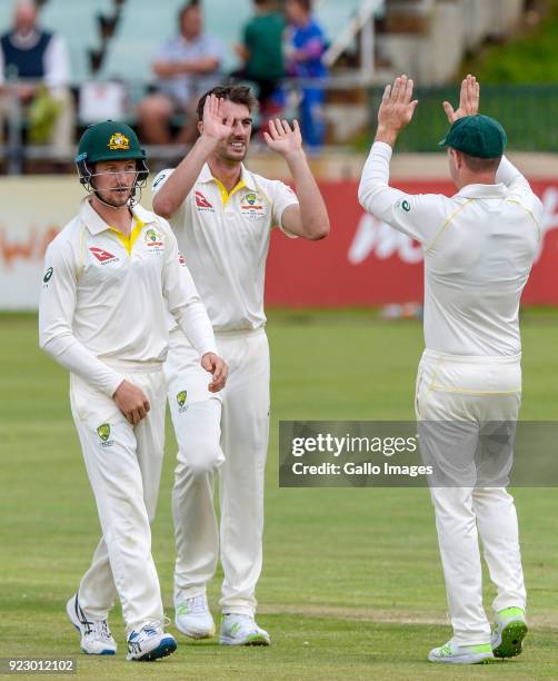 Pat Cummins of Australia celebrates after dismissing Senuran Muthusamy of South Africa during day 1 of the Tour match between South Africa A and...