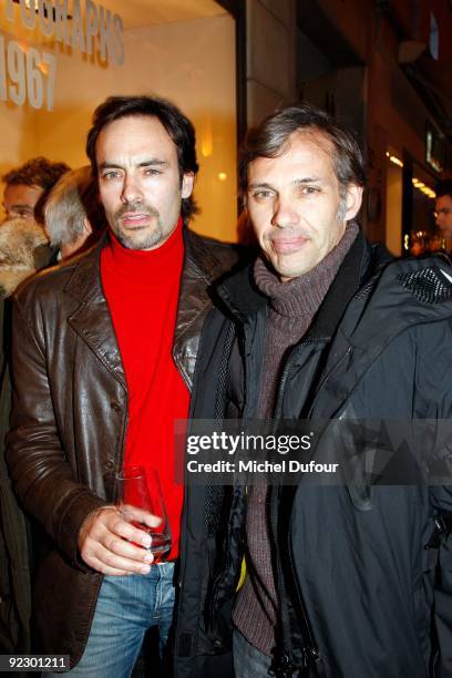 Anthomy Delon and Paul Belmondo attend Dennis Hopper Book Launch Party Hosted by Diego Della Vallee at Hogan Store on October 22, 2009 in Paris,...