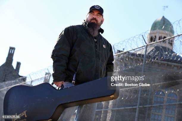 Country singer Mickey Lamantia poses for a portrait outside the Rhode Island Department of Corrections, where he he works as a guard, in Cranston, RI...