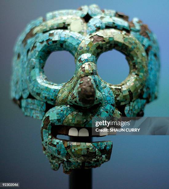 Turquoise mosaic mask dating from 1350-1521 known as 'The Mask of Tlaloc' is pictured at the 'Moctezuma Aztec Ruler' exhibition at the British museum...