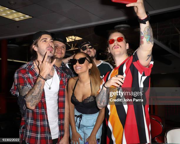 Juan David M. Castano, Juan David Huertas Clavijo, Pablo Mejia Bermudez ,David Escobar Gallego of Piso21 and Anitta visit The Enrique Santos Show At...