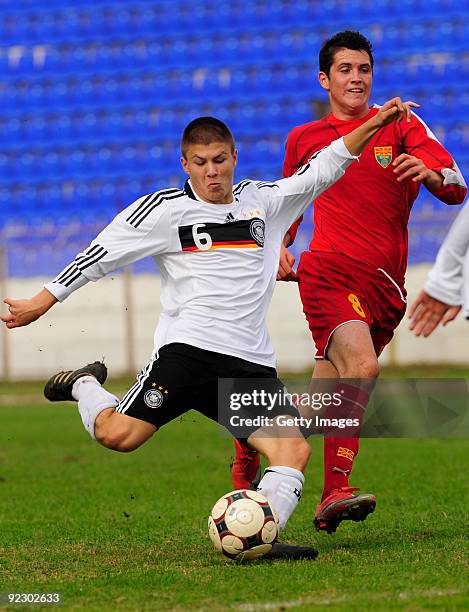 Vladimir Rankovic of Germany and Destan Hadzija of Macedonia fight for the ball during the U17 Euro qualifying match between Germany and Macedonia at...