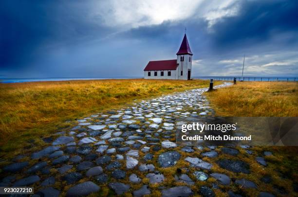 the famous church in hellnar iceland - hellnar stock pictures, royalty-free photos & images