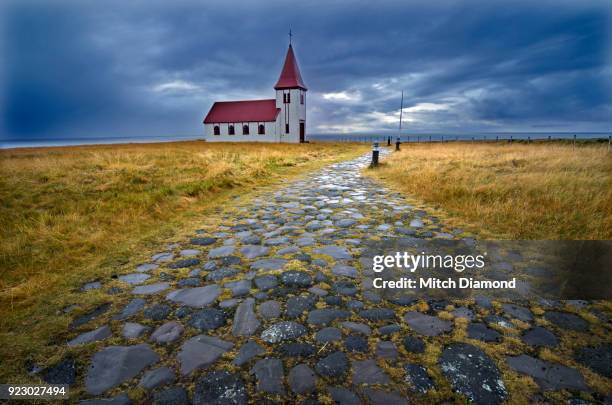 the famous church in hellnar iceland - hellnar stock pictures, royalty-free photos & images