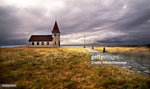 the famous church in hellnar iceland - hellnar stock pictures, royalty-free photos & images