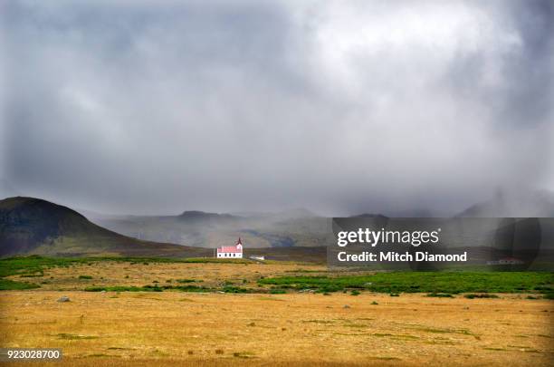 the famous church in hellnar iceland - hellnar stock pictures, royalty-free photos & images